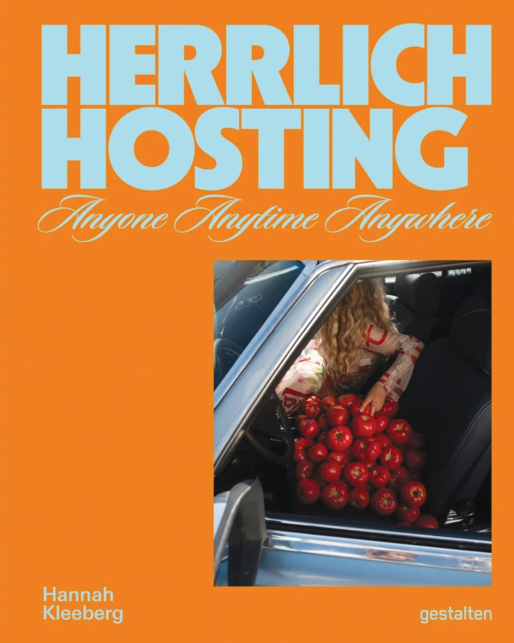 Orange book cover reading “Herrlich Hosting—Anyone Anytime Anywhere,” with a photo of a car seat filled with tomatoes and a person leaning insid.